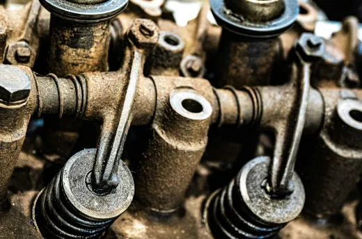 Valves and rocker arms on a stripped cylinder head