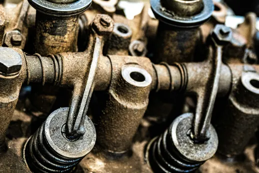 Valves and rocker arms on a stripped cylinder head